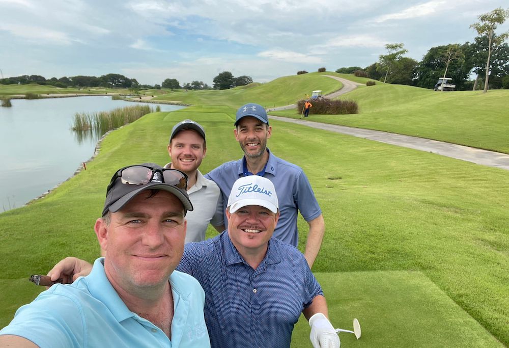Oliver Palmer and James Green of DQventures, with friends Chris Brankin and Ali Watkins at Laguna Golf and Country Club in Singapore.